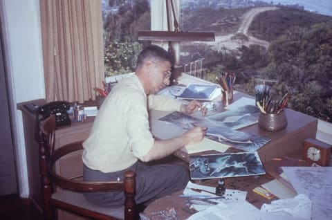 Ted Geisel, a.k.a. Dr. Seuss, works at his desk at home in La Jolla, California in 1957.