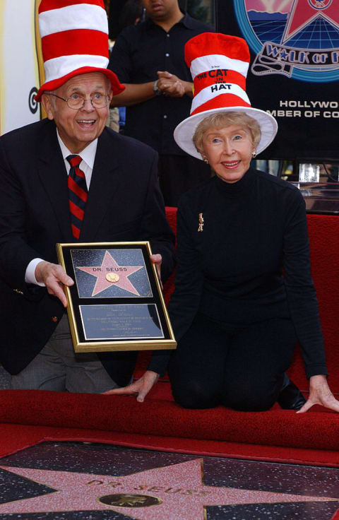 Audrey Geisel, Ted Geisel's widow, and honorary mayor of Hollywood Johnny Grant attend a ceremony honoring Dr. Seuss with a star on the Hollywood Walk of Fame in 2004.