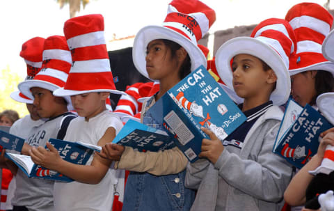 Children read from 'The Cat in the Hat' at a ceremony honoring Dr. Seuss's star on the Hollywood Walk of Fame.