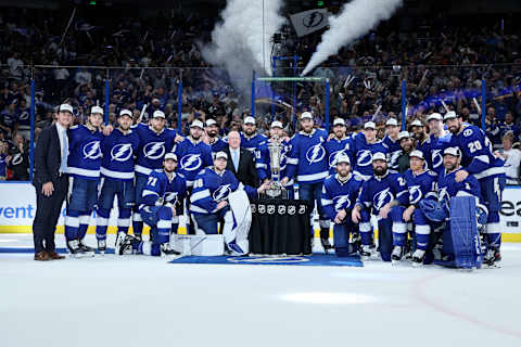 TAMPA, FLORIDA – JUNE 11: The Tampa Bay Lightning pose with the Eastern Conference Prince of Wales Trophy after defeating the New York Rangers with a score of 2 to 1 in Game Six to win the Eastern Conference Final of the 2022 Stanley Cup Playoffs at Amalie Arena on June 11, 2022 in Tampa, Florida. (Photo by Andy Lyons/Getty Images)