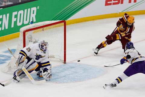 Apr 7, 2022; Boston, MA, USA; Minnesota forward Matthew Knies (89) scores on Minnesota State goaltender Dryden McKay (29) during the first period of the 2022 Frozen Four college ice hockey national semifinals at TD Garden. Mandatory Credit: Winslow Townson-USA TODAY Sports