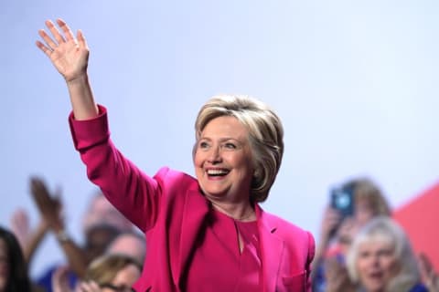 Hilary Clinton waving.