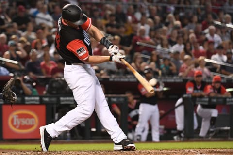 PHOENIX, AZ – AUGUST 26: Paul Goldschmidt #44 of the Arizona Diamondbacks hits a three run home run in the third inning of the MLB game against the Seattle Mariners at Chase Field on August 26, 2018 in Phoenix, Arizona. All players across MLB wear nicknames on their backs as well as colorful, non-traditional uniforms featuring alternate designs inspired by youth-league uniforms during Players Weekend. (Photo by Jennifer Stewart/Getty Images)