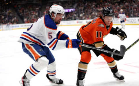 ANAHEIM, CALIFORNIA – APRIL 05: Trevor Zegras #11 of the Anaheim Ducks defends against Cody Ceci #5 of the Edmonton Oilers during the first period of a game at Honda Center on April 05, 2023 in Anaheim, California. (Photo by Sean M. Haffey/Getty Images)