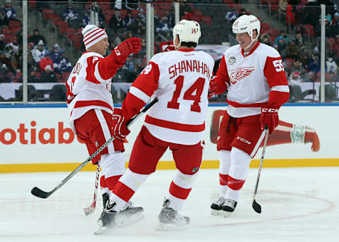 Dec 31, 2016; Toronto, ON, Canada; Detroit Red Wings forward Brendan Shanahan (14) is congratulated by forward Martin Lapointe (20) after scoring a goal in the second period against the Toronto Maple Leafs during the 2017 Rogers NHL Centennial Classic Alumni Game at BMO Field. Mandatory Credit: Tom Szczerbowski-USA TODAY Sports