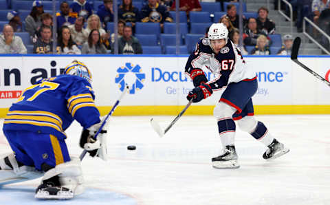 Sep 30, 2023; Buffalo, New York, USA; Columbus Blue Jackets left wing James Malatesta (67) takes a shot on Buffalo Sabres goaltender Devon Levi (27) during the first period at KeyBank Center. Mandatory Credit: Timothy T. Ludwig-USA TODAY Sports