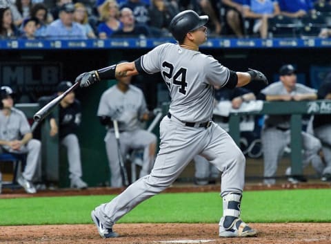 New York Yankees’ Gary Sanchez follows through on a solo home run in the ninth inning during Saturday’s baseball game against the Kansas City Royals on May 19, 2018, at Kauffman Stadium in Kansas City, Mo. (John Sleezer/Kansas City Star/TNS via Getty Images)