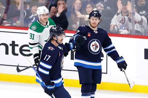 Dallas Stars, Tyler Seguin (91); Winnipeg Jets, Mason Appleton (22), Adam Lowry (17). Mandatory Credit: James Carey Lauder-USA TODAY Sports