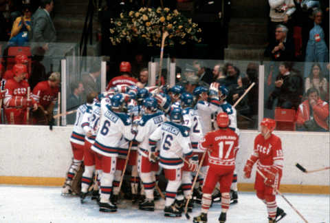 LAKE PLACID, NY – FEBRUARY 22: The United States Hockey team celebrates after they defeated the Soviet Union during a metal round game of the Winter Olympics February 22, 1980  (Photo by Focus on Sport/Getty Images) *** Local Caption ***