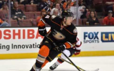 Mar 14, 2016; Anaheim, CA, USA;Anaheim Ducks defenseman Cam Fowler (4) skates with the puck against the New Jersey Devils at Honda Center. The Ducks won 7-1. Mandatory Credit: Kirby Lee-USA TODAY Sports