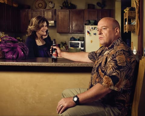 Betsy Brandt and Dean Norris as Marie and Hank Schrader in Breaking Bad.