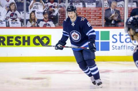 WINNIPEG, MB – APRIL 18: Jacob Trouba #8 of the Winnipeg Jets takes part in the pre-game warm up prior to NHL action against the St. Louis Blues in Game Five of the Western Conference First Round during the 2019 NHL Stanley Cup Playoffs at the Bell MTS Place on April 18, 2019 in Winnipeg, Manitoba, Canada. (Photo by Darcy Finley/NHLI via Getty Images)