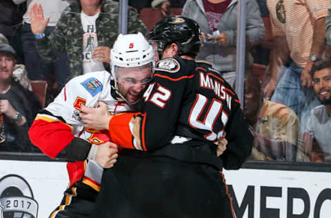 ANAHEIM, CA – APRIL 4: Mark Giordano #5 of the Calgary Flames and Josh Manson #42 of the Anaheim Ducks fight during the third period of the game at Honda Center on April 4, 2017. (Photo by Debora Robinson/NHLI via Getty Images)