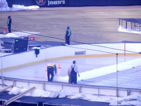 Workers on the ice at Coors Field. Photo credit: Nadia Archuleta