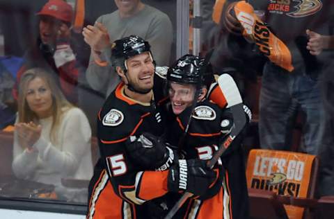 ANAHEIM, CA: Anaheim Ducks captain Ryan Getzlaf (15) with rightwing Jakob Silfverberg (33) after Silfverberg scored a goal in the first period of the 2018 Stanley Cup playoffs first round, Game 2 on April 14, 2018. (Photo by John Cordes/Icon Sportswire via Getty Images)