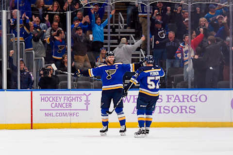 ST. LOUIS, MO – NOVEMBER 1: Alex Pietrangelo #27 of the St. Louis Blues congratulates David Perron #57 of the St. Louis Blues after he scored the game winning goal against Columbus Blue Jackets in overtime at Enterprise Center on November 1, 2019 in St. Louis, Missouri. (Photo by Joe Puetz/NHLI via Getty Images)