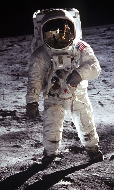 Buzz Aldrin walks on the Moon.