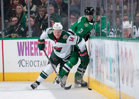 DALLAS, TX – FEBRUARY 3: Joel Eriksson Ek #14 of the Minnesota Wild tries to keep the puck away against John Klingberg #3 of the Dallas Stars at the American Airlines Center on February 3, 2018 in Dallas, Texas. (Photo by Glenn James/NHLI via Getty Images)