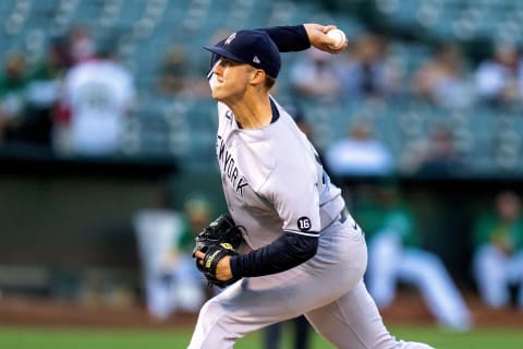 Aug 26, 2021; Oakland, California, USA; New York Yankees starting pitcher Jameson Taillon (50) delivers against the Oakland Athletics during the first inning at RingCentral Coliseum. Mandatory Credit: Neville E. Guard-USA TODAY Sports