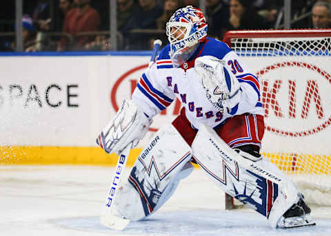 NEW YORK, NY – FEBRUARY 08: New York Rangers Goalie Henrik Lundqvist (30) pays tribute to 1994 Stanley Cup Champion Rangers Goalie Mike Richter by wearing a replica of Richter’s mask during the National Hockey League game between the Carolina Hurricanes and the New York Rangers on February 8, 2019 at Madison Square Garden in New York, NY. (Photo by Joshua Sarner/Icon Sportswire via Getty Images)