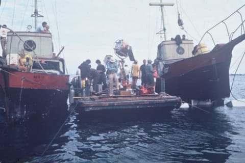 The Jaws crew works on a platform between the Orca and Orca II.