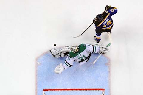 Nov 28, 2016; St. Louis, MO, USA; Dallas Stars goalie Antti Niemi (31) defends the net against St. Louis Blues center Jori Lehtera (12) during the second period at Scottrade Center. The Blues won 4-3 in overtime. Mandatory Credit: Jeff Curry-USA TODAY Sports