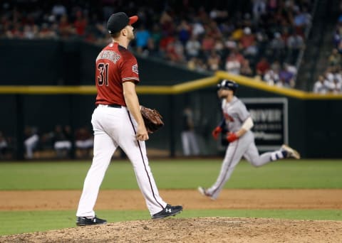 PHOENIX, AZ – SEPTEMBER 09: Brad Boxberger #31 of the Arizona Diamondbacks walks back to the mound after giving up a three-run home run to Ender Inciarte #11 of the Atlanta Braves during the ninth inning of an MLB game at Chase Field on September 9, 2018 in Phoenix, Arizona. (Photo by Ralph Freso/Getty Images)