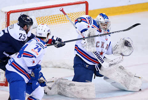 MAGNITOGORSK, RUSSIA – APRIL 8, 2017: Metallurg Magnitogorsk’s Danis Zaripov (L back), and SKA St Petersburg’s Nikolai Prokhorkin (L front) and goaltender Igor Shestyorkin in Leg 1 of the 2016/2017 Kontinental Hockey League Gagarin Cup final at Metallurg Arena; SKA St Petersburg won the game 5-4. Anton Novoderezhkin/TASS (Photo by Anton Novoderezhkin\TASS via Getty Images)