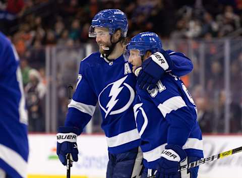 Dec 1, 2022; Philadelphia, Pennsylvania, USA; Tampa Bay Lightning center Steven Stamkos (91) celebrates with defenseman Victor Hedman (77). Mandatory Credit: Bill Streicher-USA TODAY