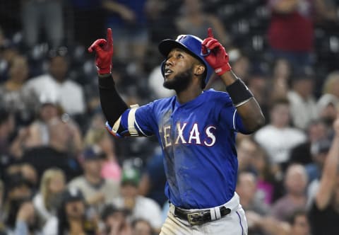 SAN DIEGO, CA – SEPTEMBER 14: Jurickson Profar #19 of the Texas Rangers celebrates after hitting a two-run home run during the seventh inning of a baseball game against the San Diego Padres at PETCO Park on September 14, 2018 in San Diego, California. (Photo by Denis Poroy/Getty Images)