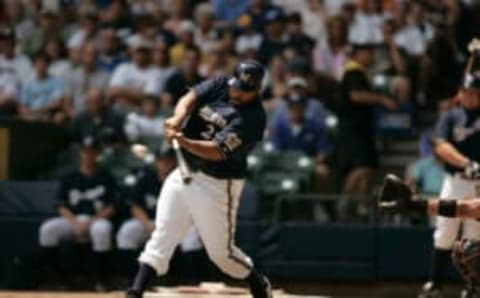 Milwaukee Brewers batter Prince Fielder hits a double off San Francisco Giants starting pitcher Barry Zito in the first inning at Miller Park in Milwaukee, WI. Fielder then scored on Corey Hart‘s two run home run in a 7-5 win over the Giants. (Photo by Allen Fredrickson/Icon SMI/Icon Sport Media via Getty Images)