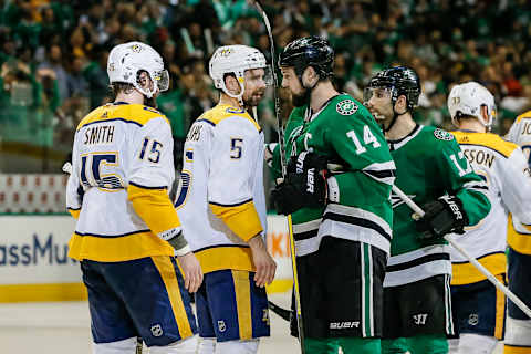 DALLAS, TX – APRIL 22: Dallas Stars left wing Jamie Benn (14) shakes hands with Nashville Predators defenseman Dan Hamhuis (5) after the game between the Dallas Stars and the Nashville Predators on April 22, 2019 at the American Airlines Center in Dallas, Texas. Dallas defeats Nashville 2-1 in overtime. (Photo by Matthew Pearce/Icon Sportswire via Getty Images)