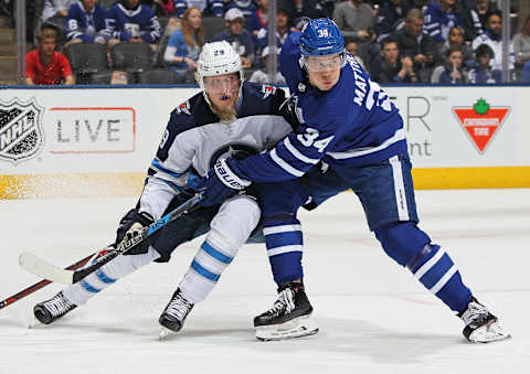 TORONTO, ON – MARCH 31: Patrik Laine #29 of the Winnipeg Jets skates against Auston Matthews #34 of the Toronto Maple Leafs. (Photo by Claus Andersen/Getty Images)