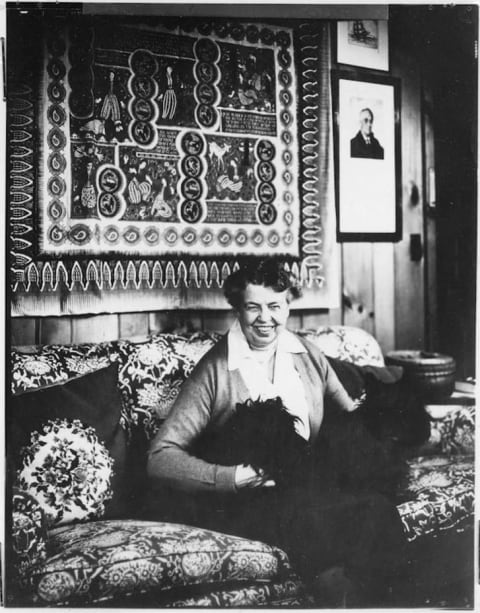 Eleanor Roosevelt sits with her dogs at Val-Kill, her cottage in Hyde Park, NY.