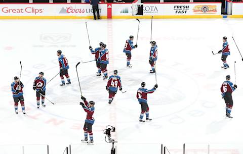 DENVER, CO – DECEMBER 31: Members of the Colorado Avalanche salute the crowd after a win against the New York Islanders at the Pepsi Center on December 31, 2017 in Denver, Colorado. The Avalanche defeated the Islanders 6-1. (Photo by Michael Martin/NHLI via Getty Images)