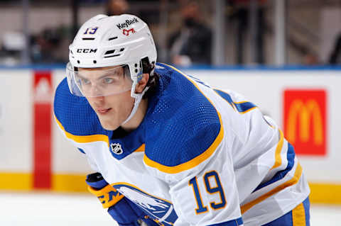 ELMONT, NEW YORK – DECEMBER 30: Peyton Krebs #19 of the Buffalo Sabres skates against the New York Islanders at the UBS Arena on December 30, 2021 in Elmont, New York. (Photo by Bruce Bennett/Getty Images)