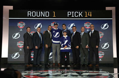 CHICAGO, IL – JUNE 23: (L-R) Amateur scout Brad Whelen, assistant general manager and director of player personnel Pat Verbeek, general manager Steve Yzerman, 14th overall pick Cal Foote, assistant general manager Julien Brisebois, draft runner, director of player development Stacy Roest, amateur scout Darryl Plandowski and and director of amateur scouting All Murray of the Tampa Bay Lightning pose for a photo onstage during Round One of the 2017 NHL Draft at United Center on June 23, 2017 in Chicago, Illinois. (Photo by Dave Sandford/NHLI via Getty Images)