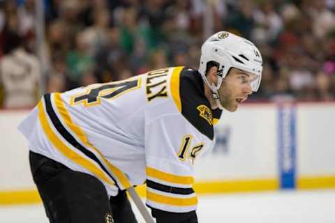 Feb 13, 2016; Saint Paul, MN, USA; Boston Bruins forward Brett Connolly (14) at the faceoff in the second period against the Minnesota Wild at Xcel Energy Center. Mandatory Credit: Brad Rempel-USA TODAY Sports