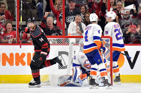 RALEIGH, NORTH CAROLINA – MAY 01: Justin Williams #14 of the Carolina Hurricanes reacts after scoring the go-ahead goal against the New York Islanders during the third period of Game Three of the Eastern Conference Second Round during the 2019 NHL Stanley Cup Playoffs at PNC Arena on May 01, 2019 in Raleigh, North Carolina. The Hurricanes won 5-2. (Photo by Grant Halverson/Getty Images)