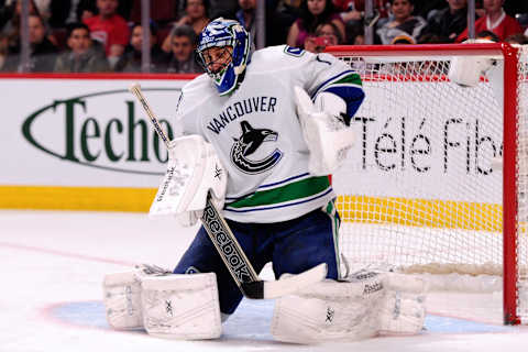 Roberto Luongo #1 of the Vancouver Canucks stops the puck  (Photo by Richard Wolowicz/Getty Images)