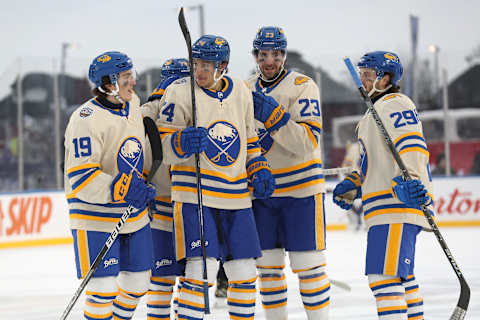 HAMILTON, ONTARIO – MARCH 13: Members of the Buffalo Sabres celebrate a goal against the Toronto Maple Leafs in the third period during the Heritage Classic at Tim Hortons Field on March 13, 2022 in Hamilton, Ontario. (Photo by Claus Andersen/Getty Images)