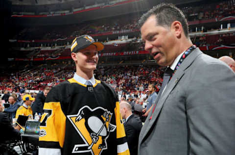 CHICAGO, IL – JUNE 24: Clayton Phillips meets with assistant general manager Bill Guerin after being selected 93rd overall by the Pittsburgh Penguins during the 2017 NHL Draft. (Photo by Bruce Bennett/Getty Images)