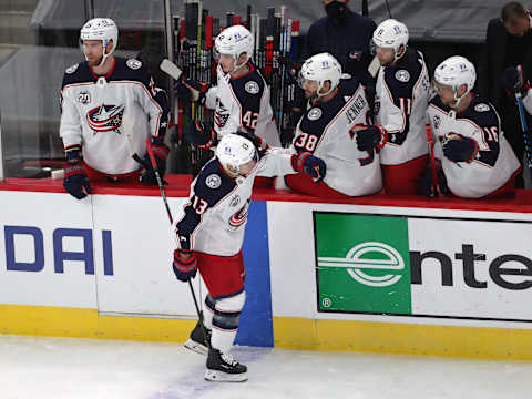 Feb 13, 2021; Chicago, Illinois, USA; Columbus Blue Jackets right wing Cam Atkinson (13) is congratulated for scoring during the second period against the Chicago Blackhawks t the United Center. Mandatory Credit: Dennis Wierzbicki-USA TODAY Sports