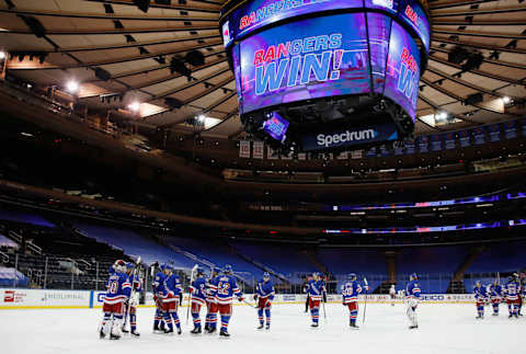 The New York Rangers celebrate after shutting out the New York Islanders . Mandatory Credit: Bruce Bennett /POOL PHOTOS-USA TODAY Sports