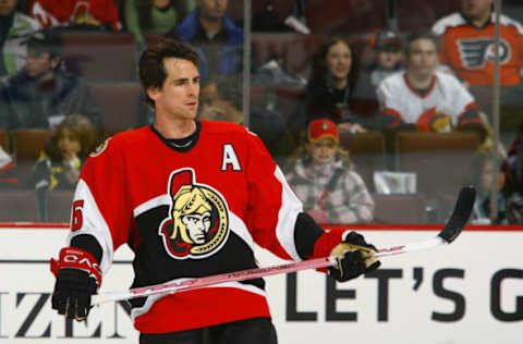 OTTAWA, CANADA – MARCH 17: Wade Redden #6 of the Ottawa Senators skates around with his “Tribute to Hockey Moms” Pink stick during warmup before a game against the Philadelphia Flyers on March 17, 2007 at the Scotiabank Place in Ottawa, Canada. The Senators won 3-2. (Photo by Phillip MacCallum/Getty Images)