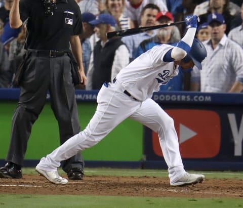 LOS ANGELES, CA – OCTOBER 27: Dodgers Yasmani Grandal reacts after striking out in the eighth inning. Los Angeles Dodgers hosted the Boston Red Sox in Game 4 of the World Series at Dodger Stadium in Boston on Oct. 27, 2018. (Photo by Stan Grossfeld/The Boston Globe via Getty Images)