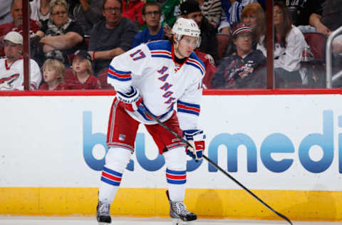 GLENDALE, AZ – FEBRUARY 14: John Moore #17 of the New York Rangers in action during the NHL game against the Arizona Coyotes at Gila River Arena on February 14, 2015, in Glendale, Arizona. The Rangers defeated the Coyotes 5-1. (Photo by Christian Petersen/Getty Images)