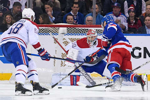 Nov 16, 2021; New York, New York, USA; New York Rangers right wing Julien Gauthier (15) scores a goal on Montreal Canadiens goaltender Cayden Primeau (30) during the third period at Madison Square Garden. Mandatory Credit: Dennis Schneidler-USA TODAY Sports