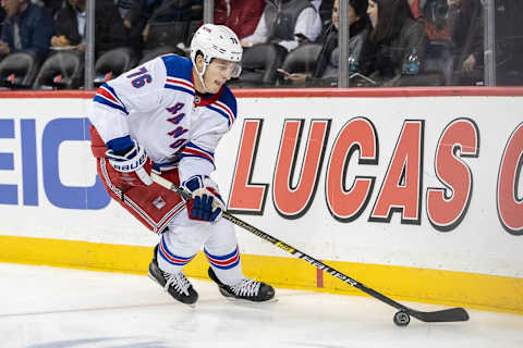 BROOKLYN, NY – NOVEMBER 15: New York Rangers defenseman, Brady Skjei (76), skates with the puck behind the net during a game between the New York Islanders and the New York Rangers on November 15, 2018 at the Barclays Center in Brooklyn, NY. (Photo by John McCreary/Icon Sportswire via Getty Images)