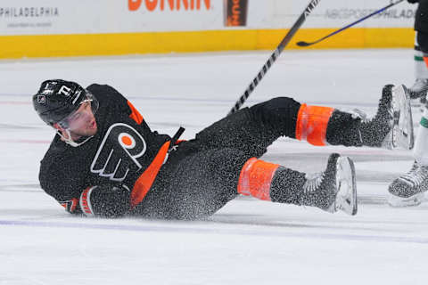 PHILADELPHIA, PA – NOVEMBER 13: Tony DeAngelo #77 of the Philadelphia Flyers falls to the ice after getting tripped during the third period against the Dallas Stars at the Wells Fargo Center on November 13, 2022 in Philadelphia, Pennsylvania. The Stars defeated the Flyers 5-1. (Photo by Mitchell Leff/Getty Images)